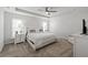 Spacious main bedroom with a king-size bed and ceiling fan at 2615 Quarterdeck Dr, Cumming, GA 30041