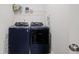 Convenient laundry room with washer and dryer at 2615 Quarterdeck Dr, Cumming, GA 30041