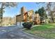 Two story home with attached garage and landscaping at 4255 Iris Brooke Ln, Snellville, GA 30039