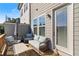 Relaxing deck with seating and an umbrella at 4219 Tifton Ln, Sugar Hill, GA 30518