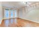 Bright living room with hardwood floors and access to patio at 400 17Th Nw St # 1134, Atlanta, GA 30363