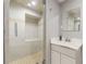 Basement bathroom with walk-in shower and floating vanity at 1847 Walker Ave, College Park, GA 30337