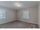 Bright bedroom with neutral walls and carpeted floors at 2301 Delowe Dr, Atlanta, GA 30344