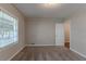 Bedroom with neutral walls, carpeted floors, and window at 2301 Delowe Dr, Atlanta, GA 30344