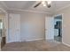 Well-lit bedroom with neutral carpeting and ample closet space at 2301 Delowe Dr, Atlanta, GA 30344