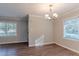 Well-lit dining room with hardwood floors and a chandelier at 2301 Delowe Dr, Atlanta, GA 30344