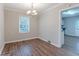 Simple dining area with hardwood floors and a chandelier at 2301 Delowe Dr, Atlanta, GA 30344