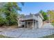 Home with a deck, garage, and large driveway at 2301 Delowe Dr, Atlanta, GA 30344