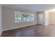 Spacious living area with hardwood floors and a view to the front yard at 2301 Delowe Dr, Atlanta, GA 30344