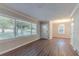 Bright living room featuring hardwood floors and large windows at 2301 Delowe Dr, Atlanta, GA 30344