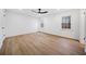 Bright bedroom with large windows, wood-look floors, and white walls at 275 Jamie Dr, Hiram, GA 30141