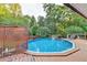 Inviting above ground pool with wooden deck at 4364 Saddlecreek Ct, Auburn, GA 30011