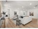 Bright, open basement recreation room with hardwood floors at 63 Black Rock Rdg, Sharpsburg, GA 30277