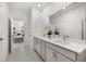 Double vanity bathroom with access to bedroom and hallway at 63 Black Rock Rdg, Sharpsburg, GA 30277