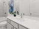 Modern bathroom with white vanity, gray tile, and updated fixtures at 63 Black Rock Rdg, Sharpsburg, GA 30277