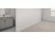 Simple bedroom with grey bathroom and neutral decor at 63 Black Rock Rdg, Sharpsburg, GA 30277