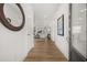 Bright and airy entryway with hardwood floors and a view of the living area at 63 Black Rock Rdg, Sharpsburg, GA 30277
