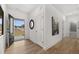 Open entryway with hardwood floors, a view of the street, and a nearby bathroom at 63 Black Rock Rdg, Sharpsburg, GA 30277