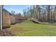 Two-story house with gray siding, wooden deck, and stairs at 63 Black Rock Rdg, Sharpsburg, GA 30277