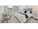 Spacious main bedroom with plush bed, ample natural light, and relaxing sitting area at 63 Black Rock Rdg, Sharpsburg, GA 30277