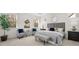 Main bedroom with plush carpet, large windows, and ensuite bathroom at 63 Black Rock Rdg, Sharpsburg, GA 30277