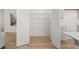 Walk-in pantry with wire shelving; maximizes storage space at 63 Black Rock Rdg, Sharpsburg, GA 30277