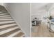 Modern staircase leading to the main living area at 63 Black Rock Rdg, Sharpsburg, GA 30277