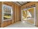 Unfinished basement room with sliding glass door and large window at 63 Black Rock Rdg, Sharpsburg, GA 30277