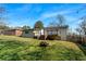 Large backyard with fire pit and deck, perfect for entertaining at 3043 Stirrup Se Ln, Atlanta, GA 30316