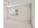 Bright bedroom with neutral walls and ceiling fan at 4248 River Green Nw Dr # 310, Atlanta, GA 30327