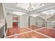 Bright dining room with hardwood floors and mirrored walls at 4248 River Green Nw Dr # 310, Atlanta, GA 30327