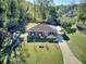 Ranch house with a large backyard and driveway at 197 Dixboro Dr, Jonesboro, GA 30238