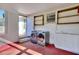 Laundry room with washer, dryer, and extra shelving at 197 Dixboro Dr, Jonesboro, GA 30238