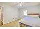 Spacious bedroom with neutral walls, hardwood floors, and ceiling fan at 197 Dixboro Dr, Jonesboro, GA 30238