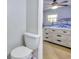 Simple bathroom with a toilet and access to bedroom at 197 Dixboro Dr, Jonesboro, GA 30238