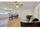 Open living room with kitchen island and hardwood floors at 197 Dixboro Dr, Jonesboro, GA 30238