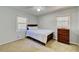 Cozy bedroom with neutral walls, hardwood floors, and ceiling fan at 197 Dixboro Dr, Jonesboro, GA 30238