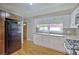 Updated kitchen features granite countertops, stainless steel appliances, and white cabinets at 197 Dixboro Dr, Jonesboro, GA 30238
