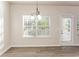 Dining room with hardwood floors and access to a deck at 4815 Candy Cv, Lithonia, GA 30038