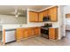 Kitchen with light wood cabinets, stainless steel appliances and granite countertops at 4815 Candy Cv, Lithonia, GA 30038