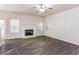 Spacious living room with hardwood floors and a fireplace at 4815 Candy Cv, Lithonia, GA 30038