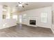 Spacious living room with hardwood floors and a fireplace at 4815 Candy Cv, Lithonia, GA 30038