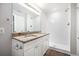 Updated bathroom with double vanity, granite countertop, and subway tile shower at 3015 Flat Shoals Rd, Atlanta, GA 30349