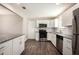 Newly renovated kitchen with granite countertops and stainless steel appliances at 3015 Flat Shoals Rd, Atlanta, GA 30349