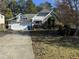 House exterior with two-car garage and landscaping at 2820 Brookford Sw Ln, Atlanta, GA 30331