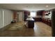 Well-equipped kitchen with dark wood cabinetry and an island at 2820 Brookford Sw Ln, Atlanta, GA 30331
