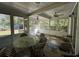 Screened porch with seating area and view of backyard at 2820 Brookford Sw Ln, Atlanta, GA 30331