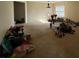Spacious living room with carpeted floors and large windows at 2820 Brookford Sw Ln, Atlanta, GA 30331