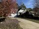 Two-story house with driveway and landscaping at 2820 Brookford Sw Ln, Atlanta, GA 30331