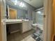 Clean bathroom with a bathtub and vanity at 2820 Brookford Sw Ln, Atlanta, GA 30331